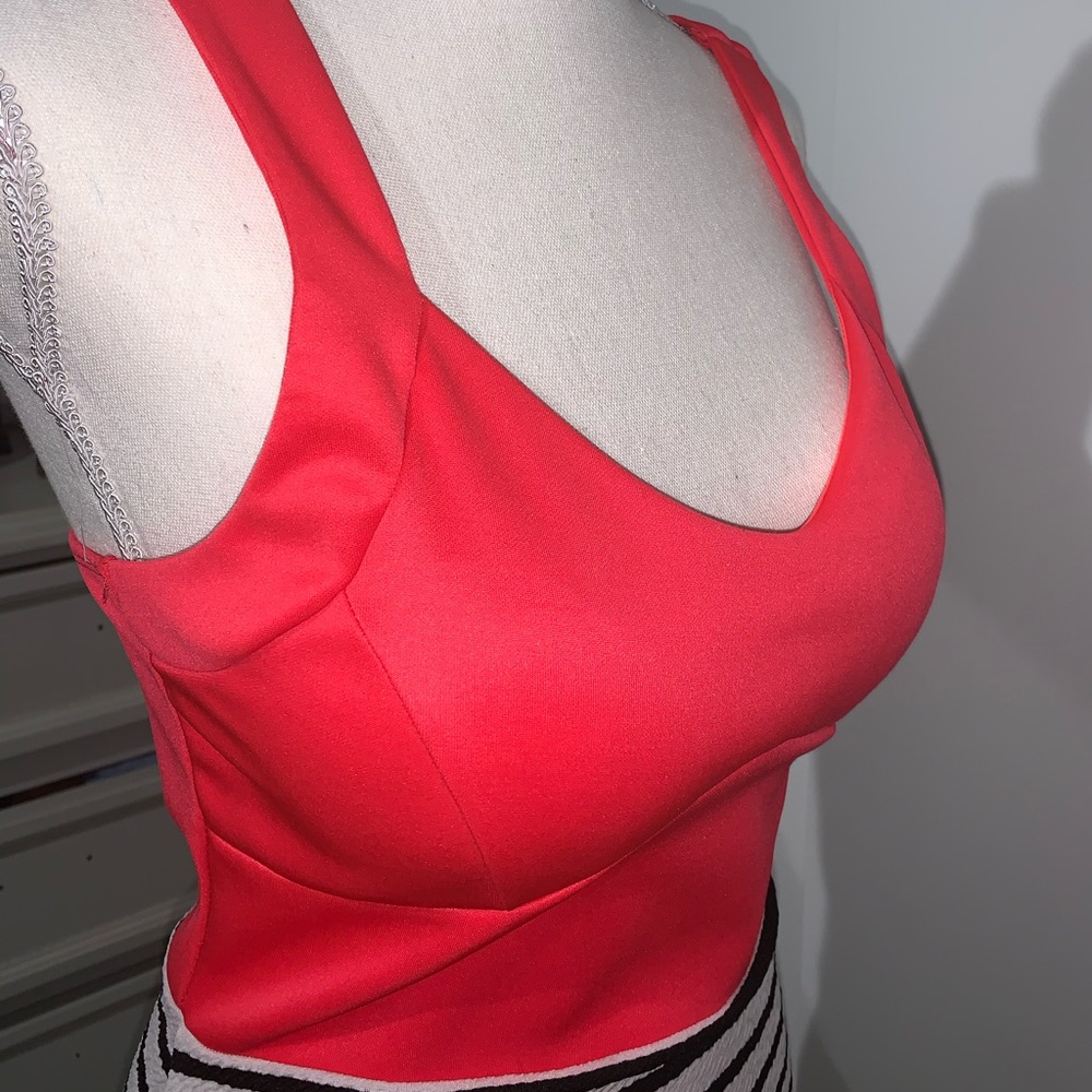 Hot pink dress with black and white stripes